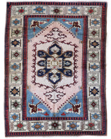 Vintage Turkish rug in a living room setting, pile rug, Turkish rug, vintage rug, portland, rug shop, bright colors, wild shaman, soft rug, bold color, Portland, Oregon, rug store, rug shop, local shop, antique rug