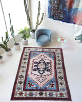 Vintage Turkish rug in a living room setting, pile rug, Turkish rug, vintage rug, portland, rug shop, bright colors, wild shaman, soft rug, bold color, Portland, Oregon, rug store, rug shop, local shop, antique rug