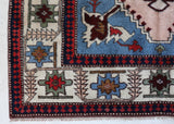 Vintage Turkish rug in a living room setting, pile rug, Turkish rug, vintage rug, portland, rug shop, bright colors, wild shaman, soft rug, bold color, Portland, Oregon, rug store, rug shop, local shop, antique rug