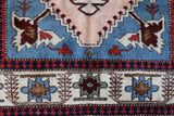 Vintage Turkish rug in a living room setting, pile rug, Turkish rug, vintage rug, portland, rug shop, bright colors, wild shaman, soft rug, bold color, Portland, Oregon, rug store, rug shop, local shop, antique rug