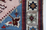 Vintage Turkish rug in a living room setting, pile rug, Turkish rug, vintage rug, portland, rug shop, bright colors, wild shaman, soft rug, bold color, Portland, Oregon, rug store, rug shop, local shop, antique rug