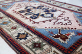 Vintage Turkish rug in a living room setting, pile rug, Turkish rug, vintage rug, portland, rug shop, bright colors, wild shaman, soft rug, bold color, Portland, Oregon, rug store, rug shop, local shop, antique rug