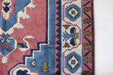 Vintage Turkish rug in a living room setting, pile rug, Turkish rug, vintage rug, portland, rug shop, bright colors, wild shaman, soft rug, bold color, Portland, Oregon, rug store, rug shop, local shop, antique rug