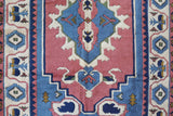 Vintage Turkish rug in a living room setting, pile rug, Turkish rug, vintage rug, portland, rug shop, bright colors, wild shaman, soft rug, bold color, Portland, Oregon, rug store, rug shop, local shop, antique rug