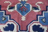 Vintage Turkish rug in a living room setting, pile rug, Turkish rug, vintage rug, portland, rug shop, bright colors, wild shaman, soft rug, bold color, Portland, Oregon, rug store, rug shop, local shop, antique rug