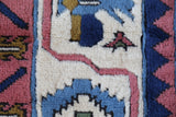 Vintage Turkish rug in a living room setting, pile rug, Turkish rug, vintage rug, portland, rug shop, bright colors, wild shaman, soft rug, bold color, Portland, Oregon, rug store, rug shop, local shop, antique rug