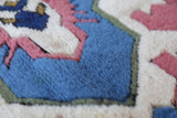 Vintage Turkish rug in a living room setting, pile rug, Turkish rug, vintage rug, portland, rug shop, bright colors, wild shaman, soft rug, bold color, Portland, Oregon, rug store, rug shop, local shop, antique rug