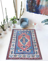 Vintage Turkish rug in a living room setting, pile rug, Turkish rug, vintage rug, portland, rug shop, bright colors, wild shaman, soft rug, bold color, Portland, Oregon, rug store, rug shop, local shop, antique rug