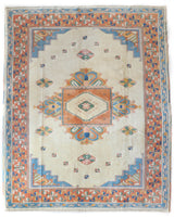 Vintage Turkish rug in a living room setting, pile rug, Turkish rug, vintage rug, portland, rug shop, bright colors, wild shaman, soft rug, bold color, Portland, Oregon, rug store, rug shop, local shop, antique rug