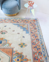 Vintage Turkish rug in a living room setting, pile rug, Turkish rug, vintage rug, portland, rug shop, bright colors, wild shaman, soft rug, bold color, Portland, Oregon, rug store, rug shop, local shop, antique rug