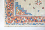 Vintage Turkish rug in a living room setting, pile rug, Turkish rug, vintage rug, portland, rug shop, bright colors, wild shaman, soft rug, bold color, Portland, Oregon, rug store, rug shop, local shop, antique rug