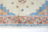 Vintage Turkish rug in a living room setting, pile rug, Turkish rug, vintage rug, portland, rug shop, bright colors, wild shaman, soft rug, bold color, Portland, Oregon, rug store, rug shop, local shop, antique rug