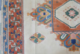 Vintage Turkish rug in a living room setting, pile rug, Turkish rug, vintage rug, portland, rug shop, bright colors, wild shaman, soft rug, bold color, Portland, Oregon, rug store, rug shop, local shop, antique rug