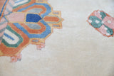Vintage Turkish rug in a living room setting, pile rug, Turkish rug, vintage rug, portland, rug shop, bright colors, wild shaman, soft rug, bold color, Portland, Oregon, rug store, rug shop, local shop, antique rug