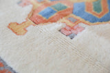Vintage Turkish rug in a living room setting, pile rug, Turkish rug, vintage rug, portland, rug shop, bright colors, wild shaman, soft rug, bold color, Portland, Oregon, rug store, rug shop, local shop, antique rug