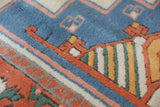 Vintage Turkish rug in a living room setting, pile rug, Turkish rug, vintage rug, portland, rug shop, bright colors, wild shaman, soft rug, bold color, Portland, Oregon, rug store, rug shop, local shop, antique rug
