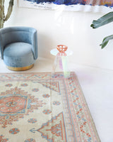 Vintage Turkish rug in living room setting, old rug, antique rug, pastel colors, faded colors, Turkish rug, vintage rug, soft rug, Portland, Oregon, rug store, rug shop, local shop