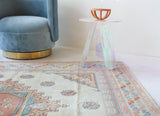 Vintage Turkish rug in living room setting, old rug, antique rug, pastel colors, faded colors, Turkish rug, vintage rug, soft rug, Portland, Oregon, rug store, rug shop, local shop