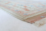Vintage Turkish rug in living room setting, old rug, antique rug, pastel colors, faded colors, Turkish rug, vintage rug, soft rug, Portland, Oregon, rug store, rug shop, local shop