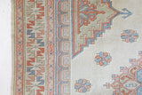 Vintage Turkish rug in living room setting, old rug, antique rug, pastel colors, faded colors, Turkish rug, vintage rug, soft rug, Portland, Oregon, rug store, rug shop, local shop
