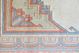 Vintage Turkish rug in living room setting, old rug, antique rug, pastel colors, faded colors, Turkish rug, vintage rug, soft rug, Portland, Oregon, rug store, rug shop, local shop