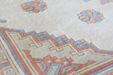 Vintage Turkish rug in living room setting, old rug, antique rug, pastel colors, faded colors, Turkish rug, vintage rug, soft rug, Portland, Oregon, rug store, rug shop, local shop