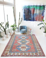 Vintage Turkish rug in a living room setting, pile rug, Turkish rug, vintage rug, portland, rug shop, bright colors, wild shaman, soft rug, bold color, Portland, Oregon, rug store, rug shop, local shop, antique rug