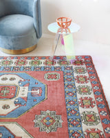 Vintage Turkish rug in a living room setting, pile rug, Turkish rug, vintage rug, portland, rug shop, bright colors, wild shaman, soft rug, bold color, Portland, Oregon, rug store, rug shop, local shop, antique rug