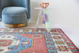 Vintage Turkish rug in a living room setting, pile rug, Turkish rug, vintage rug, portland, rug shop, bright colors, wild shaman, soft rug, bold color, Portland, Oregon, rug store, rug shop, local shop, antique rug