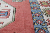 Vintage Turkish rug in a living room setting, pile rug, Turkish rug, vintage rug, portland, rug shop, bright colors, wild shaman, soft rug, bold color, Portland, Oregon, rug store, rug shop, local shop, antique rug