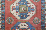 Vintage Turkish rug in a living room setting, pile rug, Turkish rug, vintage rug, portland, rug shop, bright colors, wild shaman, soft rug, bold color, Portland, Oregon, rug store, rug shop, local shop, antique rug