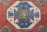 Vintage Turkish rug in a living room setting, pile rug, Turkish rug, vintage rug, portland, rug shop, bright colors, wild shaman, soft rug, bold color, Portland, Oregon, rug store, rug shop, local shop, antique rug