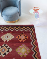 Vintage kilim rug in room decor setting, old rug, antique rug, pastel colors, faded colors, Turkish rug, vintage rug, soft rug, Portland, Oregon, rug store, rug shop, local shop, bold colors, bright colors, faded colors