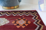 Vintage kilim rug in room decor setting, old rug, antique rug, pastel colors, faded colors, Turkish rug, vintage rug, soft rug, Portland, Oregon, rug store, rug shop, local shop, bold colors, bright colors, faded colors