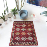 Vintage kilim rug in room decor setting, old rug, antique rug, pastel colors, faded colors, Turkish rug, vintage rug, soft rug, Portland, Oregon, rug store, rug shop, local shop, bold colors, bright colors, faded colors