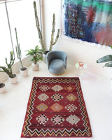Vintage kilim rug in room decor setting, old rug, antique rug, pastel colors, faded colors, Turkish rug, vintage rug, soft rug, Portland, Oregon, rug store, rug shop, local shop, bold colors, bright colors, faded colors