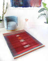 Vintage kilim rug in living room setting, bright colors, wild shaman, soft rug, bold color, Portland, Oregon, rug store, rug shop, local shop, vintage rug, modern kilim, warm colors, antique kilim rug