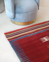 Vintage kilim rug in living room setting, bright colors, wild shaman, soft rug, bold color, Portland, Oregon, rug store, rug shop, local shop, vintage rug, modern kilim, warm colors, antique kilim rug