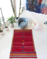 Vintage kilim rug in living room setting, bright colors, wild shaman, soft rug, bold color, Portland, Oregon, rug store, rug shop, local shop, vintage rug, modern kilim, warm colors, antique kilim rug