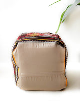 Floor pouf in a living room setting, pillow, turkish pillow, kilim pillow, home decor, decorative pillow, sham, rug pillow,  decor, home decor, pouf, floor cushion, cushion, Portland, rugshop, Oregon, Wild Shaman, ottoman