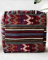 Floor pouf in a living room setting, pillow, turkish pillow, kilim pillow, home decor, decorative pillow, sham, rug pillow,  decor, home decor, pouf, floor cushion, cushion, Portland, rugshop, Oregon, Wild Shaman, ottoman