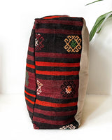 Floor pouf in a living room setting, pillow, turkish pillow, kilim pillow, home decor, decorative pillow, sham, rug pillow,  decor, home decor, pouf, floor cushion, cushion, Portland, rugshop, Oregon, Wild Shaman, ottoman