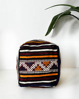 Floor pouf in a living room setting, pillow, turkish pillow, kilim pillow, home decor, decorative pillow, sham, rug pillow,  decor, home decor, pouf, floor cushion, cushion, Portland, rugshop, Oregon, Wild Shaman, ottoman