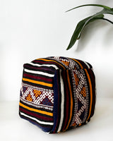Floor pouf in a living room setting, pillow, turkish pillow, kilim pillow, home decor, decorative pillow, sham, rug pillow,  decor, home decor, pouf, floor cushion, cushion, Portland, rugshop, Oregon, Wild Shaman, ottoman