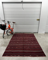 Vintage kilim rug in living room setting, bright colors, wild shaman, soft rug, bold color, Portland, Oregon, rug store, rug shop, local shop, vintage rug, modern kilim, warm colors, antique rug, antique kilim