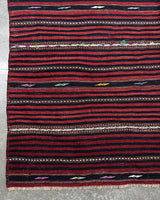 Vintage kilim rug in living room setting, bright colors, wild shaman, soft rug, bold color, Portland, Oregon, rug store, rug shop, local shop, vintage rug, modern kilim, warm colors, antique rug, antique kilim