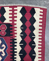 Vintage kilim rug in living room setting, bright colors, wild shaman, soft rug, bold color, Portland, Oregon, rug store, rug shop, local shop, vintage rug, modern kilim, warm colors, antique rug, antique kilim