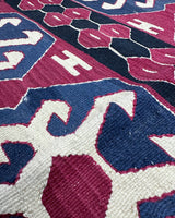 Vintage kilim rug in living room setting, bright colors, wild shaman, soft rug, bold color, Portland, Oregon, rug store, rug shop, local shop, vintage rug, modern kilim, warm colors, antique rug, antique kilim