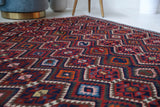 Vintage kilim rug in living room setting, bright colors, wild shaman, soft rug, bold color, Portland, Oregon, rug store, rug shop, local shop, vintage rug, modern kilim, warm colors