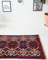 Vintage Turkish runner rug in a living room setting, pile rug, Turkish rug, vintage rug, portland, rug shop, bright colors, wild shaman, soft rug, bold color, Portland, Oregon, rug store, rug shop, local shop, antique rug